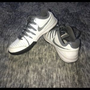 White and Grey Nike Vapor Court athletic shoes